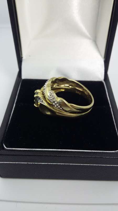 9ct Gold Light blue Topaz double band